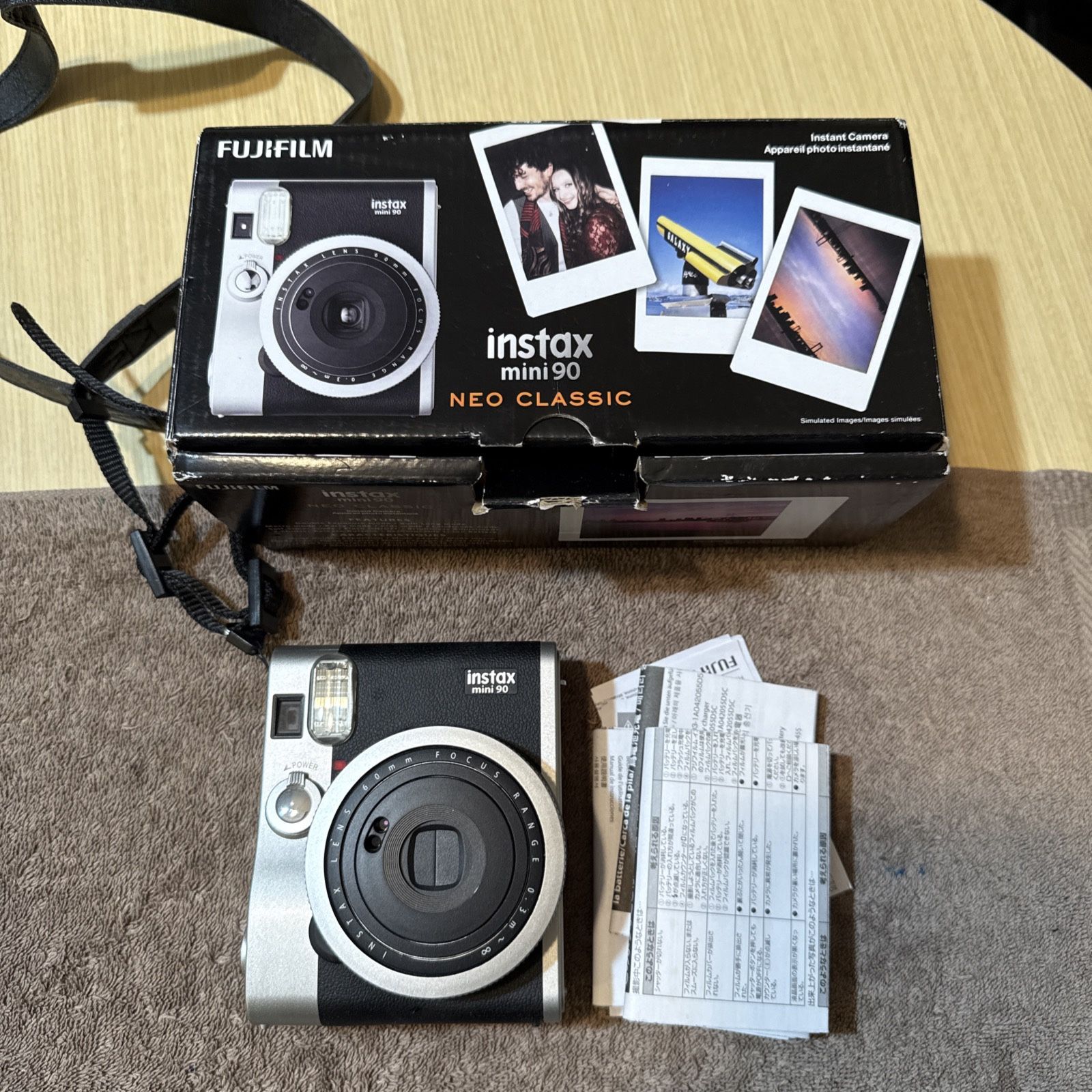 Fujifilm Instax Mini 90 Neo Classic Instant Film Camera Black/Silver with battery and original box. No charger. Camera is in an excellent condition