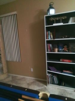 Bookshelf set chairs clock