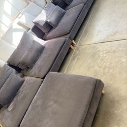 Modern IKEA SÖDERHAMN modular sectional sofa in dark gray/charcoal color.