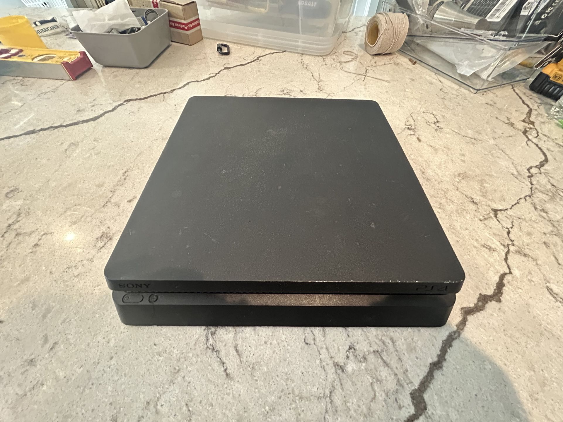 PS4 Slim ( With Cords, No Controller, With One Account)