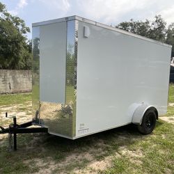 Brand new cargo trailer 6 x 12 extra tall interior Premium poly core exterior with a three-year factory warranty with title Orlando  Fla