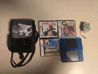 Nintendo DS with 4 games,  Pokémon case, charger and stylus