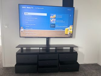Tv stand and 65” 4k Roku tv