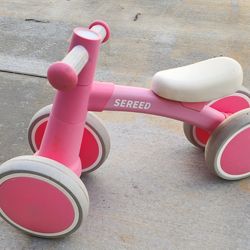 Pink Childrens bike push bike