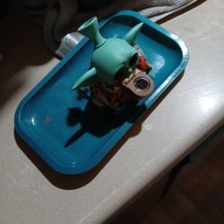 A Like New Baby Yoda Bong( Used Only A Few Times) And Has Been Since Cleaned Out Along With A Slightly Used Ricky And Morty Tobacco Tray
