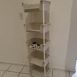 5-Tier Storage Shelf with Wheels — Brand new in box, easy to assemble.