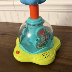 Bright Starts Press And Glow Spinner - Musical Baby Toy