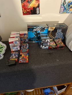 $ 600 3 Prismatic, 1 surging spark booster pack, 1 black bolt elite trainer box (etb) 2 black bolt booster bundles 1 mega evolution lacatio elitle tra
