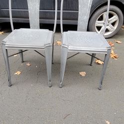 2 silver metal chairs in good condition