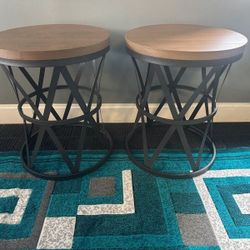 Two barrel style side tables