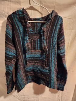 Black and blue Baha print hoodie. Fits like a Size Large. Very good condition.