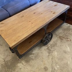 Gordillo Wood Coffee Table W/ Wheels