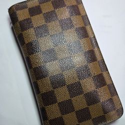 LV AUTHENTIC  Damier Ebene Zippy Wallet.