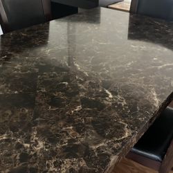 Dining table With 4 Chairs Bought From Ashley Furniture 
