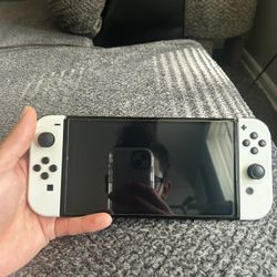 Nintendo Switch OLED with Pikachu controller & 2 games- Super Smash Bros Ultimate & Zelda Tears of the Kingdom