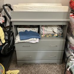 Grey changing table