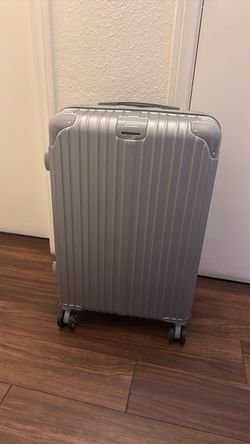 Silver Hardshell Suitcase – Used Once