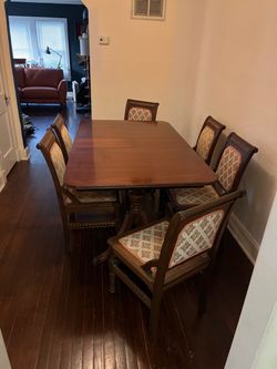 Victorian style antique table with six chairs