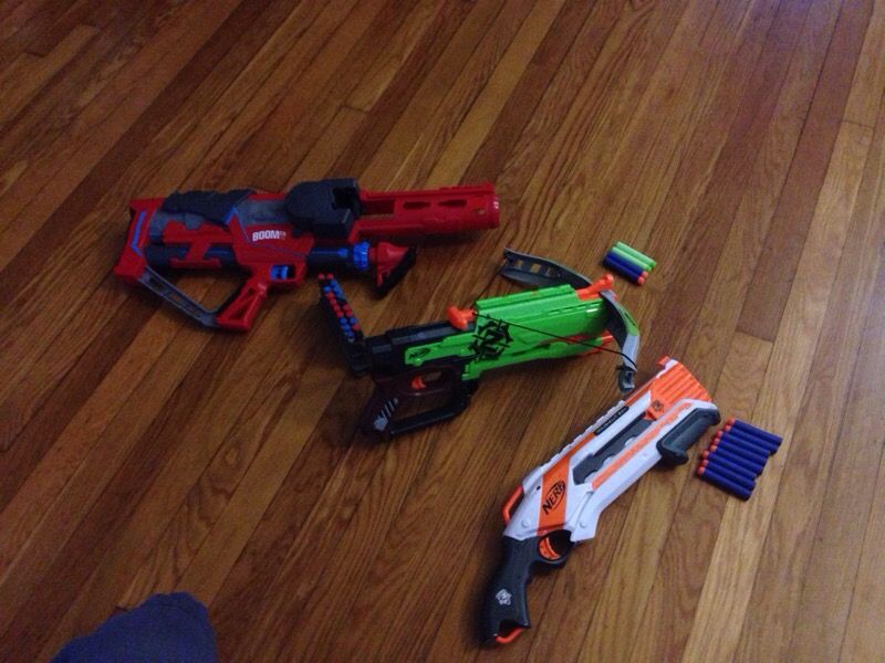 Zombie cross bow, Boomco rapid madness and Nerf rough cut toy guns