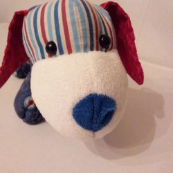 Daschie Ganz collectable red white and blue paisley print very cute 16"long stuffed dog. Excellent condition. No signs of wear.PERFECT.