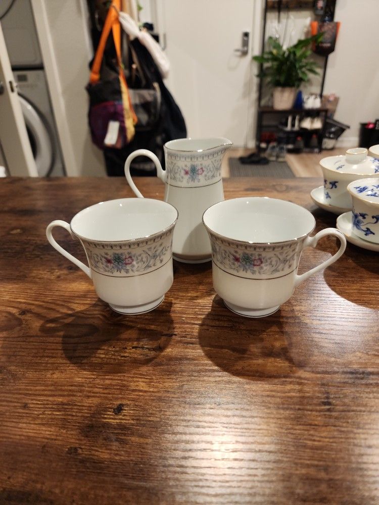 Crown Ming Harmony (Verge) fine china, a creamer pitcher and two footed cups.
