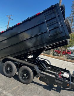 Scissor hoist dump trailer