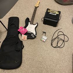 Electic Guitar With Amp (Capo ,Cable, Strings, Picks, Case Included)