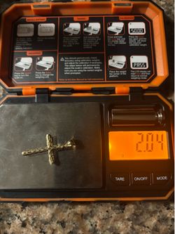 14 karat cross pendent