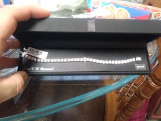 Sterling silver 1/4 ct j.w diamond tennis bracelet