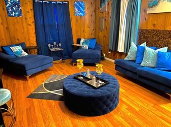 Blue sectional with ottoman
