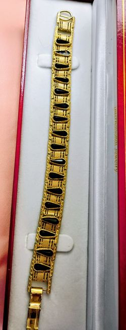 Gold-Tone Bracelet with Black Stone Inlays