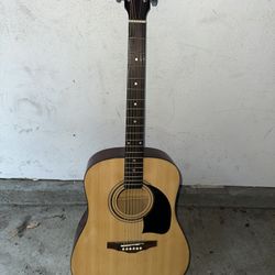 Sweet-sounding Lyon By Washburn Acoustic Guitar