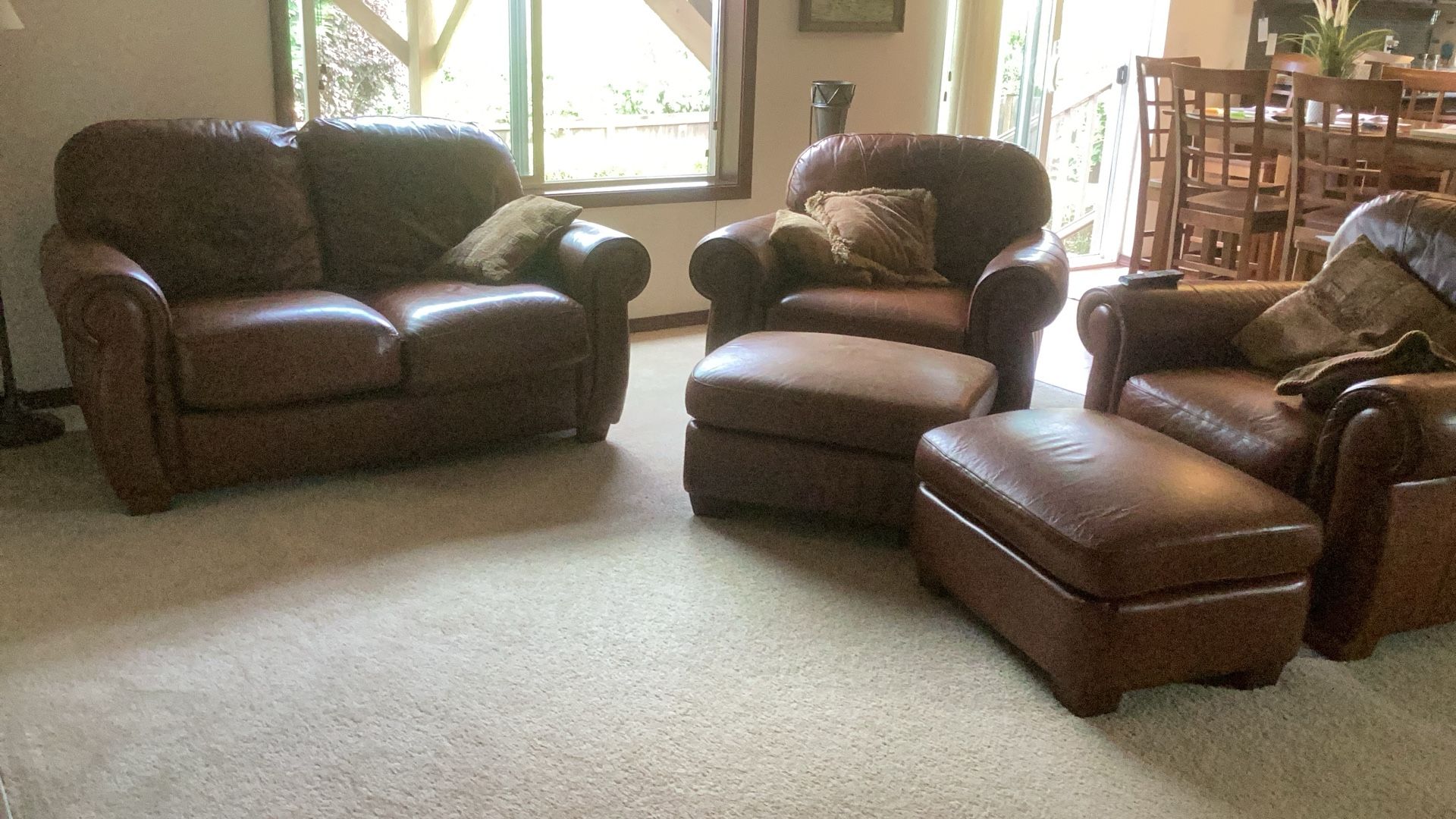 Leather Loveseat, Matching Chairs And Footstools