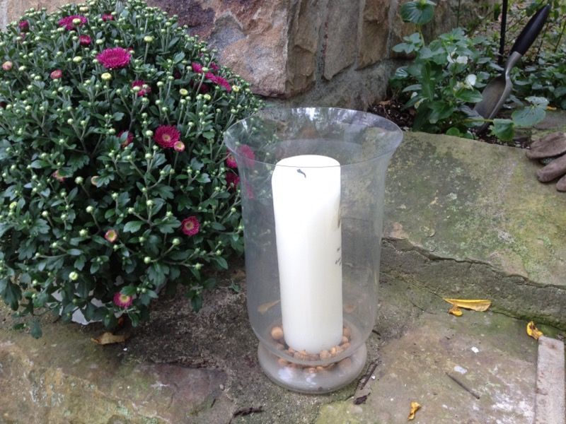 Hurricane glass lantern with with scented candle