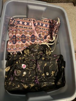 $80obo Bin full of clothing and hand bags!