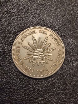 Un Peso Resplandor Silver Coin