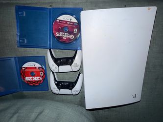 PS5 with 2 PS5 controllers 2 PS5 games
