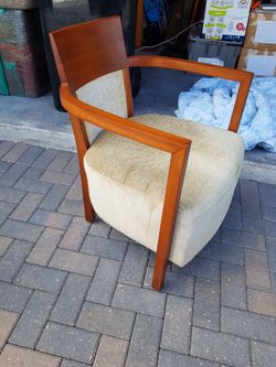 Cherry wood armchair, elegant and timeless Nordic style.