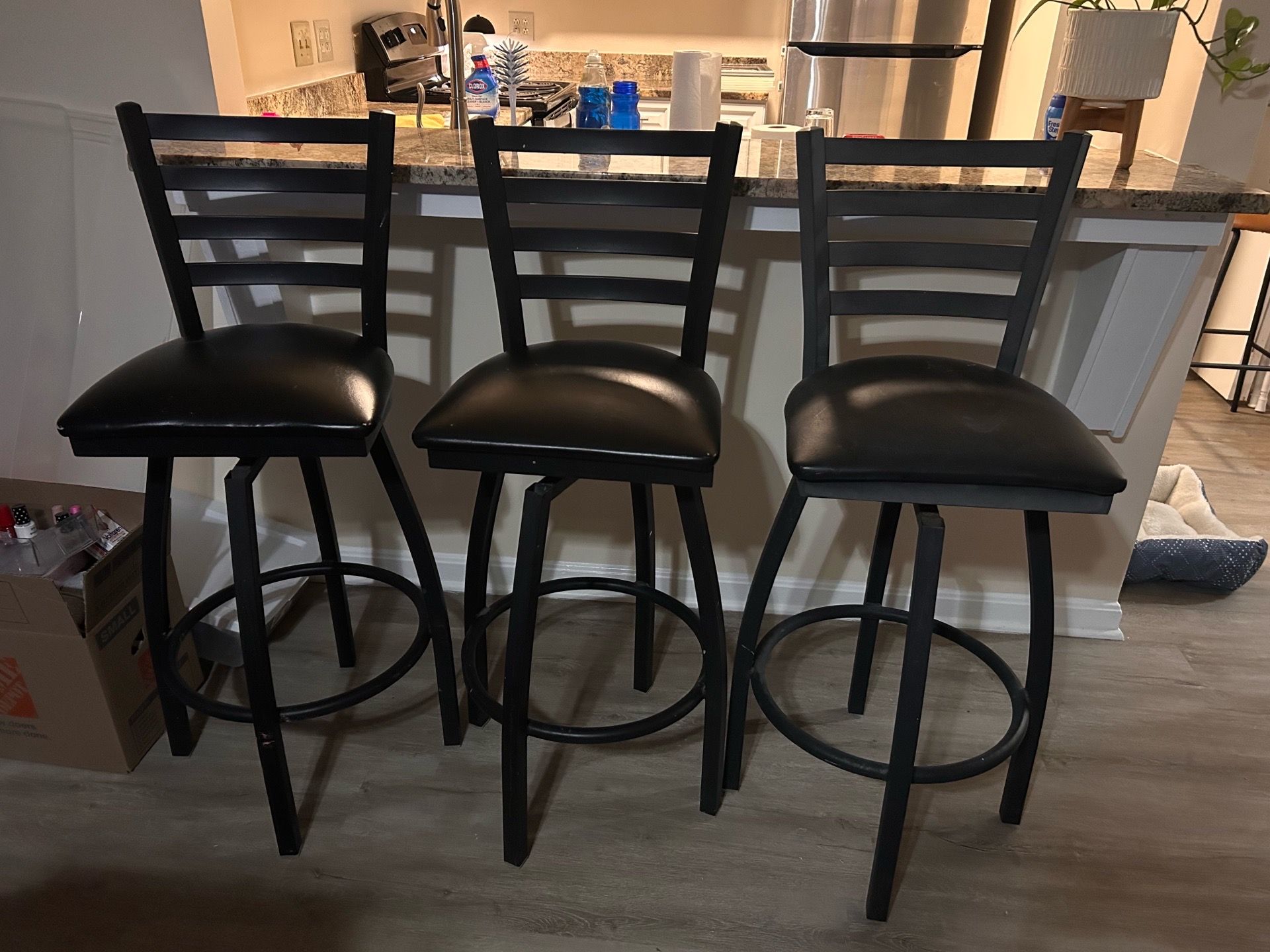 3 black metal bar chairs