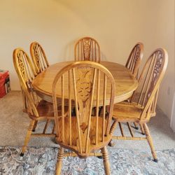 Dinner table with  6  chair it is use a couple months but it is like new 