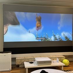 Epson LS300 UST and Vividstorm Floor Rising 120” S Pro Screen