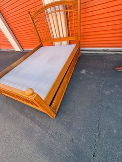 Queen bed with underneath storage cabinet