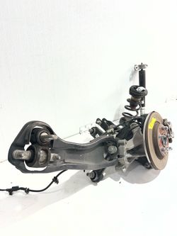 (4357) 17-25 Chrysler Pacifica Left Rear Knee Assembly Suspension 2017 2018 2019 2020 2021 2022 2023 2024 2025