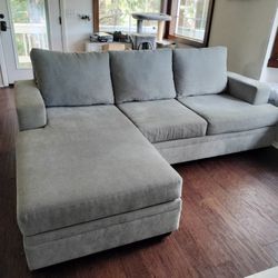 Bonaterra Grey Sofa 97" W/ Queen Bed And Reversible Chaise