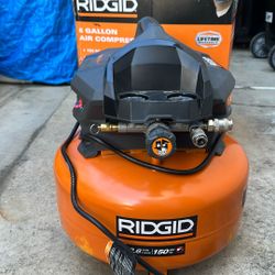 RIDGID 6 Gal. 150 PSI Portable Electric Oil-Free Jobsite Pancake Air Compressor with Dual Pressure Gauges and 2-Quick Couplers
