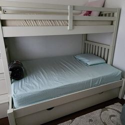 All Wood Bunk Bed. Can sleep up to 4 people . 2 Twins and 1 Full