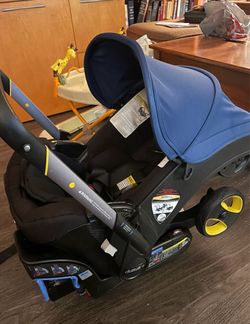 Doona car seat stroller with base