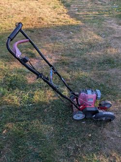 Used - Troy-Bilt 9 in. 30 cc 4-Stroke Gas Walk-Behind Edger.