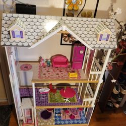 BEAUTIFUL  DOLL HOUSE. SOLID WOODEN, FREE 15 ACCESSORIES WITH ELECTRONIC SOUND MAKING TOILET COMODE. BEST ACTIVITY FOR SUMMER BREAK. 