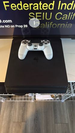 Sony PlayStation 4 Slim with Controller